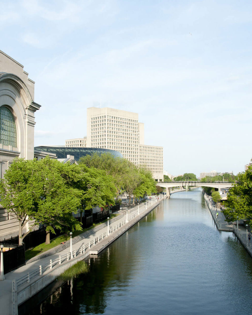 a canal with a river in Ottawa